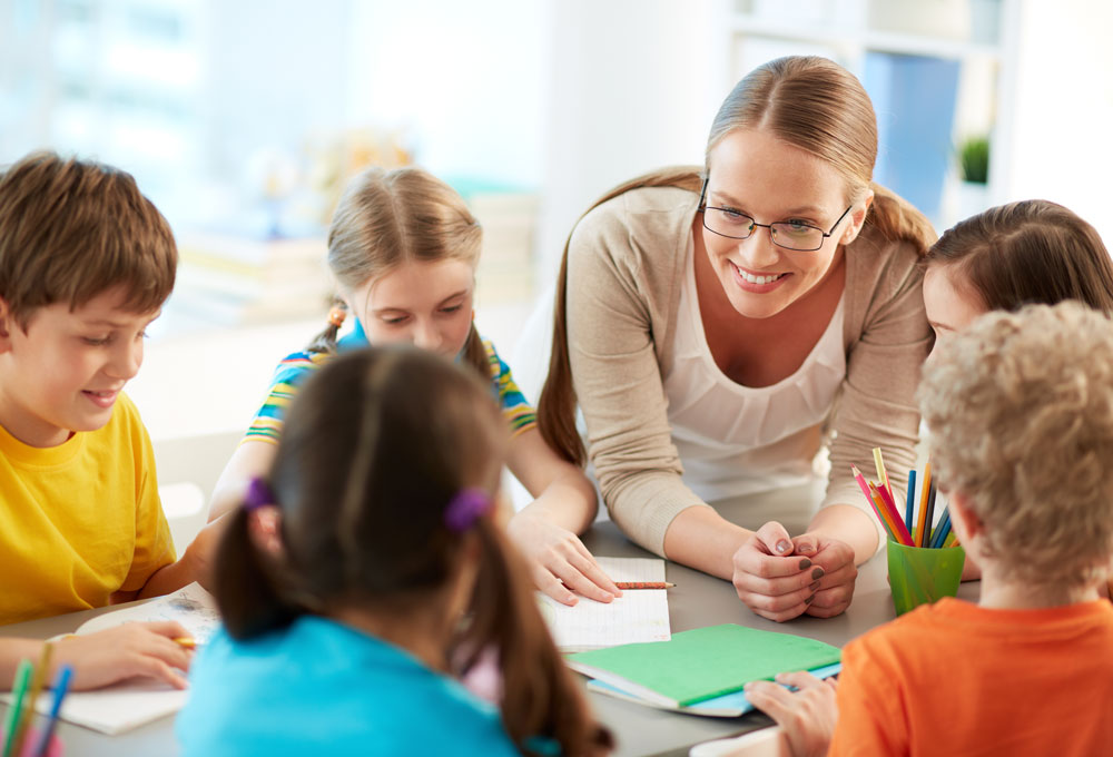 Teacher with school children